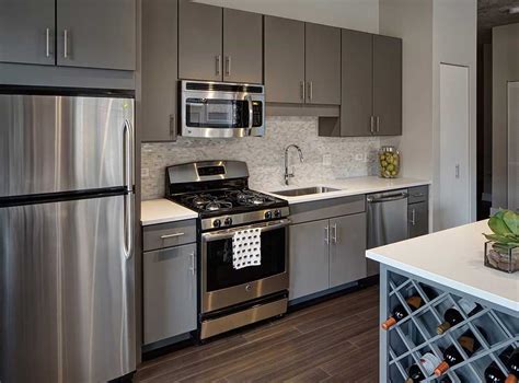 light grey cabinets with stainless steel appliances|grey kitchen cabinets.